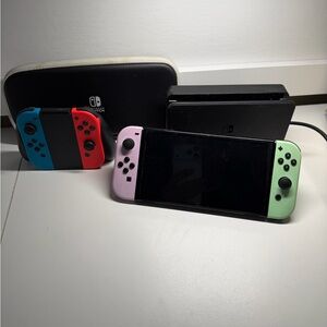 Nintendo Switch Console with Joy-Con Controllers - Red, Blue, Pink, Green